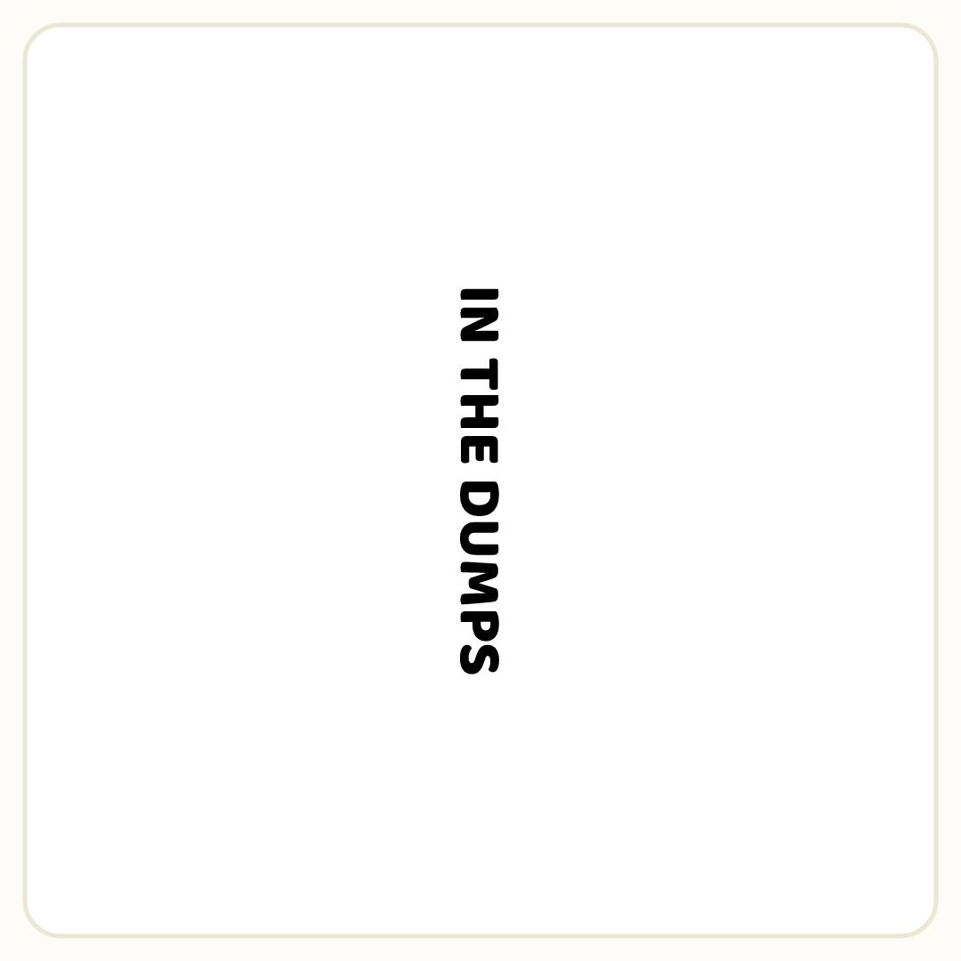 Rebus puzzle: the word &quot;IN THE DUMPS&quot; rotated so it reads downward